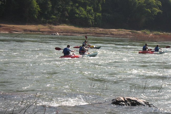 FULL DAY – Kuang Si Waterfall, Kayak on the Nam Ou / Mekong River, Pak Ou Caves - Lunch at Manifa Elephant Camp