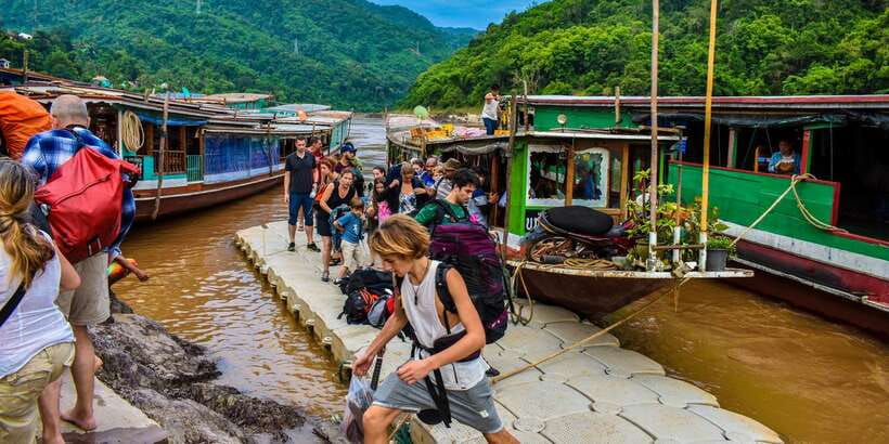 Full-Day Private Guided Pak Ou Caves & Ethnic Village Tour - Lunch, timing, and the $159 cost