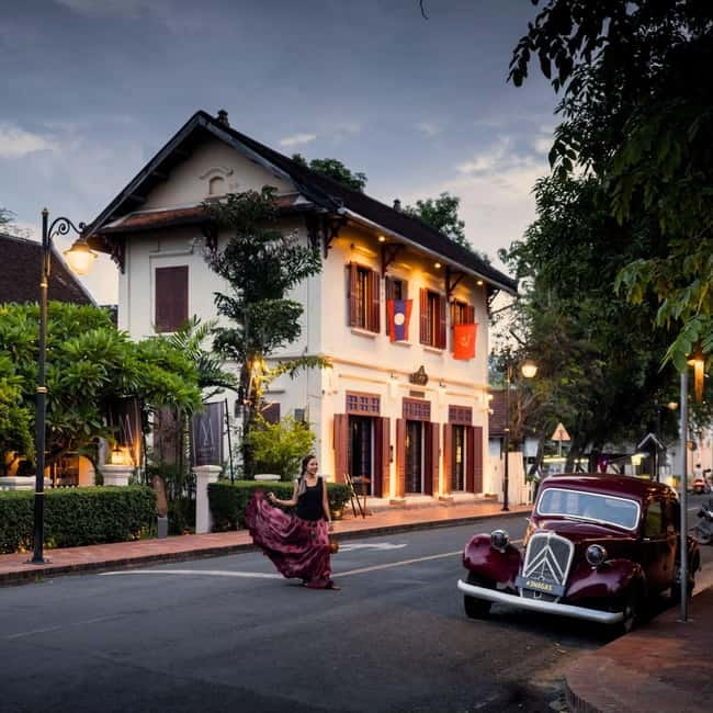 Luang Prabang: Audio-Guided City Tour in Electric Car - Starting at Wine & Co on Sakhaline Road