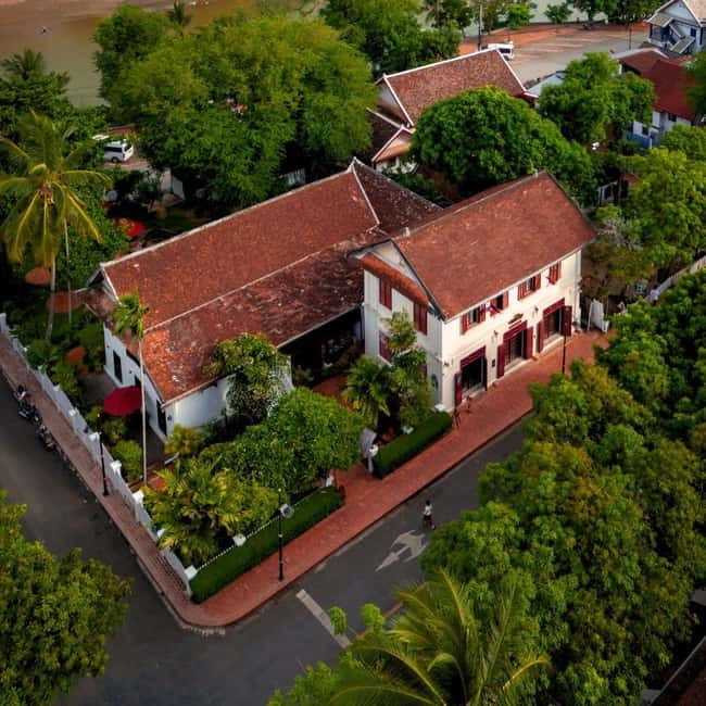 Luang Prabang: Audio-Guided City Tour in Electric Car - Crossing Luang Prabang’s historic peninsula