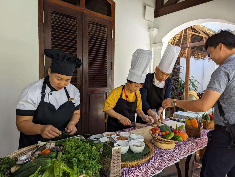 Luang Prabang: Cooking Class at the Former Royal Palace - Cooking Lao dishes with the group