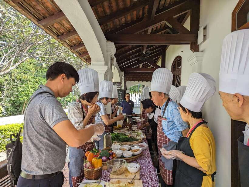Luang Prabang: Cooking Class at the Former Royal Palace - Reading Luang Prabang through its morning market