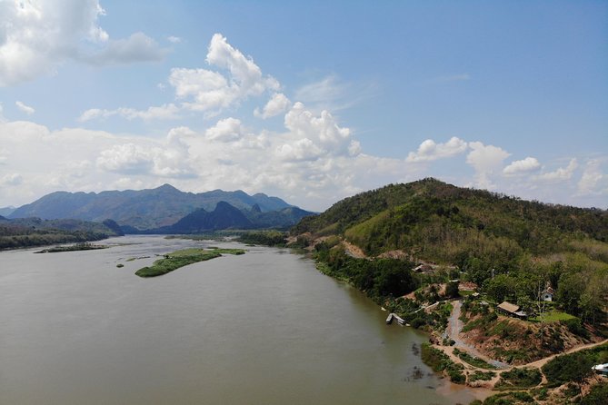 Luang Prabang: Cruise to Pak Ou Caves & Kuang Si Waterfalls - The Hmong house and village stop