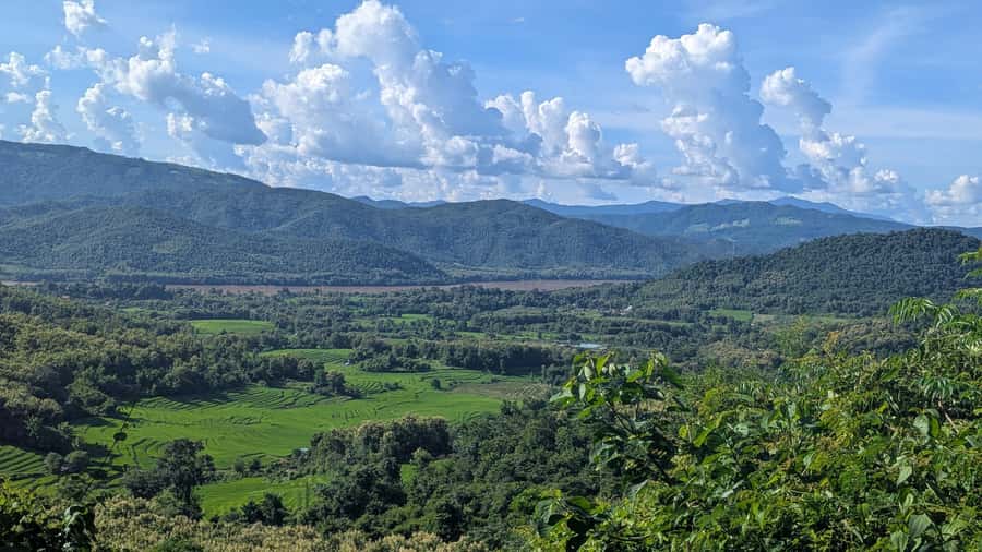 Luang Prabang: Full Day Trek to Kuang Si Waterfall & Village - Reaching the three levels of Kuang Si Falls