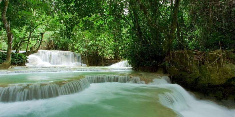 Luang Prabang: Kuang Si Bike Ride & Long-Tail Boat Cruise - The downhill ride to the Mekong