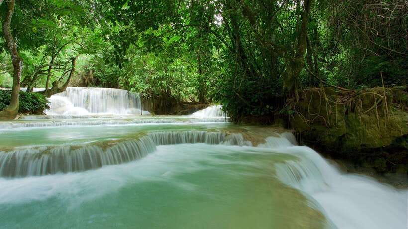 Luang Prabang: Kuang Si Bike Ride & Long-Tail Boat Cruise - Starting at the bike shop in Luang Prabang