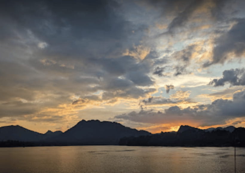 Luang Prabang: Mekong Sunset Cruise & Lao Tasting Dinner - A bamboo leaf, a small fish, and written worries