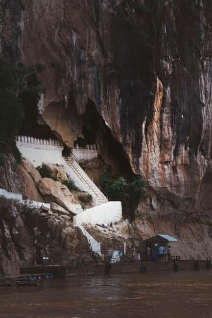 Luang Prabang: Morning Alms Giving & Pak Ou Caves Cruise - Exploring the Buddha images at Pak Ou Caves