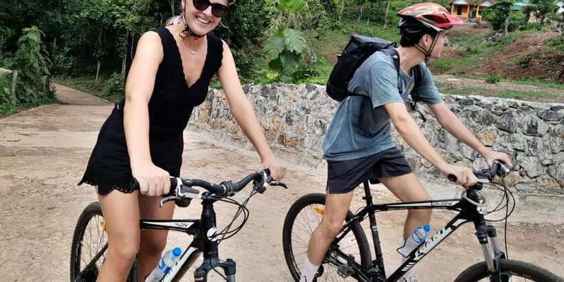 Luang Prabang: Pottery Workshop & Wat Chomphet cycling Tour - Making pottery in Ban Chan
