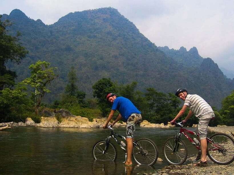 Vang Vieng: Blue Lagoon and Countryside Bike Tour with Lunch - The Climb to Phu Kham Cave